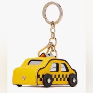 KATE SPADE CHARMED ON A ROLL TAXI BAG CHARM